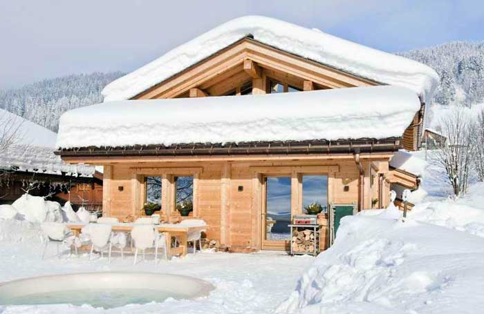Le Chalet Inarpa location vacances hiver  grand chalet de luxe à louer à la Clusaz été et hiver situé aux Confins